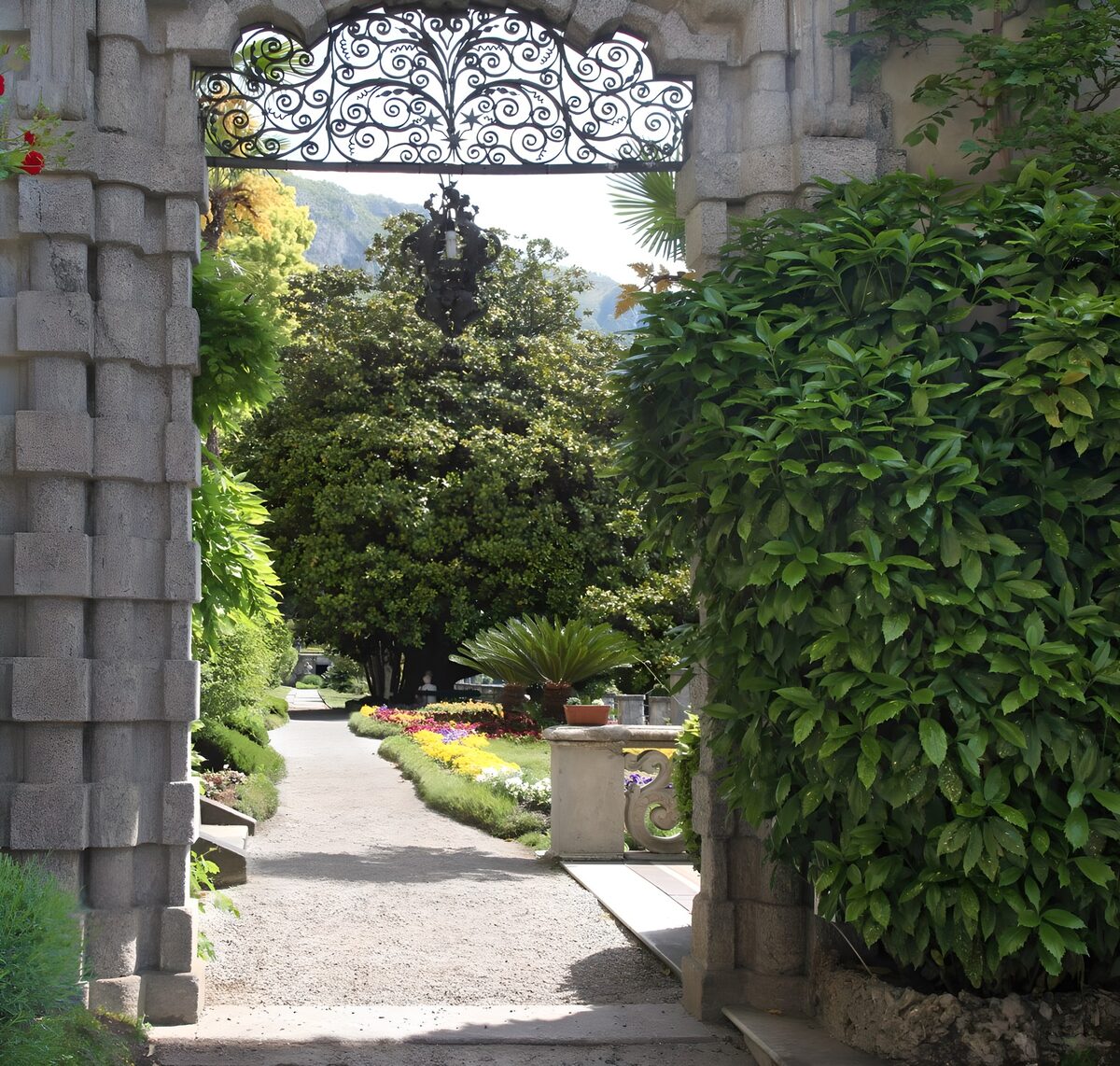 Serene Garden Pathway Through Arched Gate