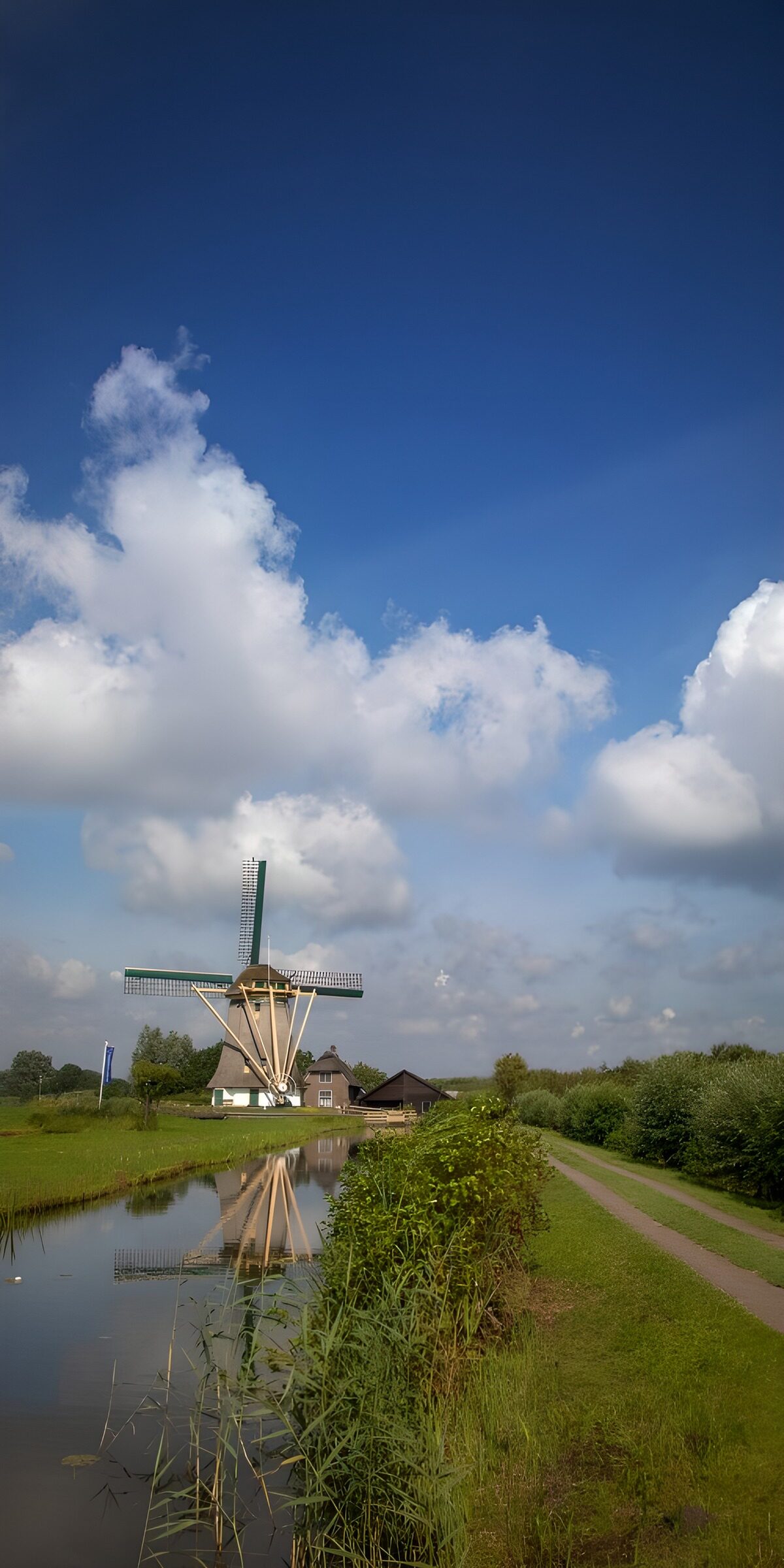 Windmill Reflection in Tranquil Waters
