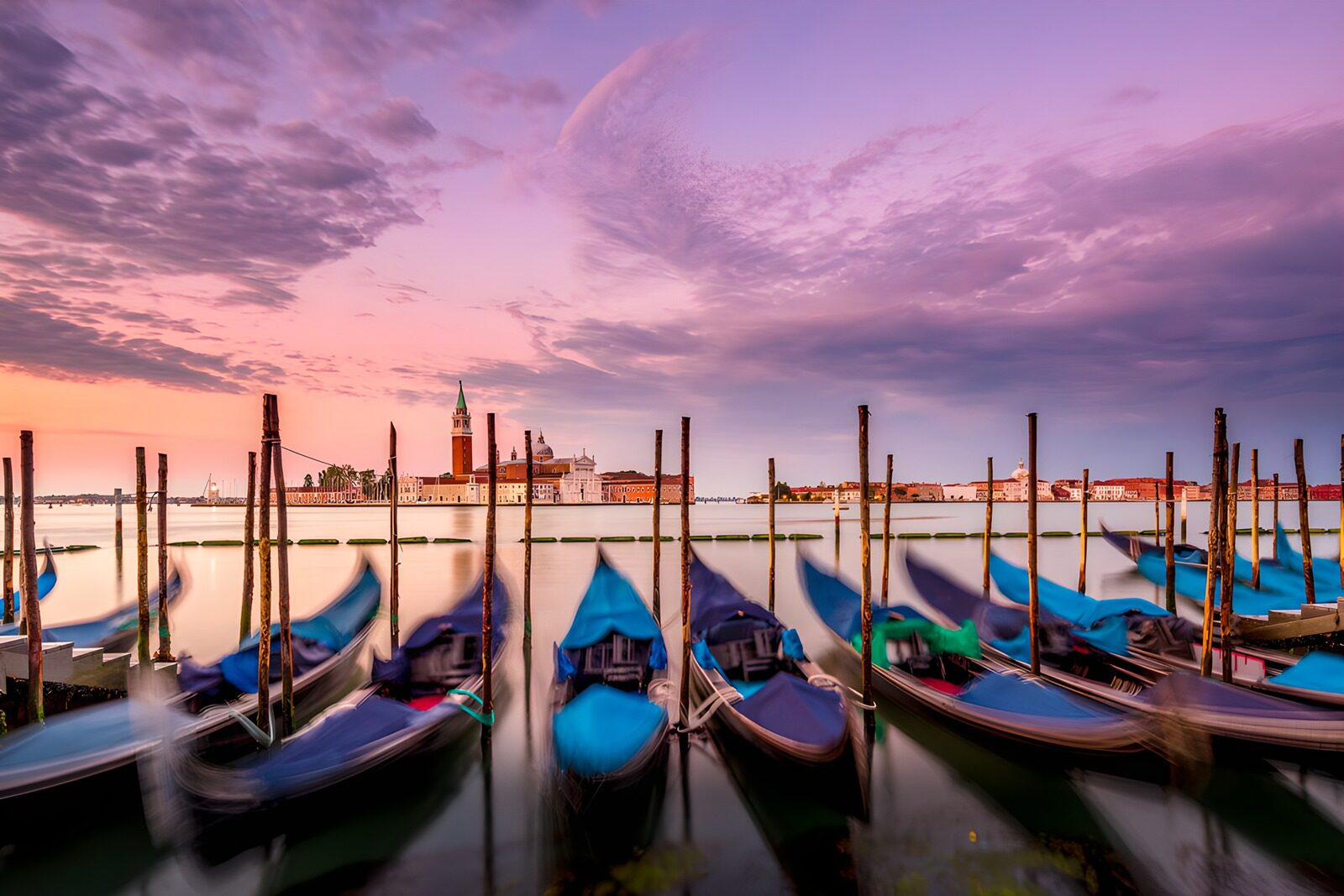 OCCOM7119599: Serene Sunset over Venetian Gondolas
