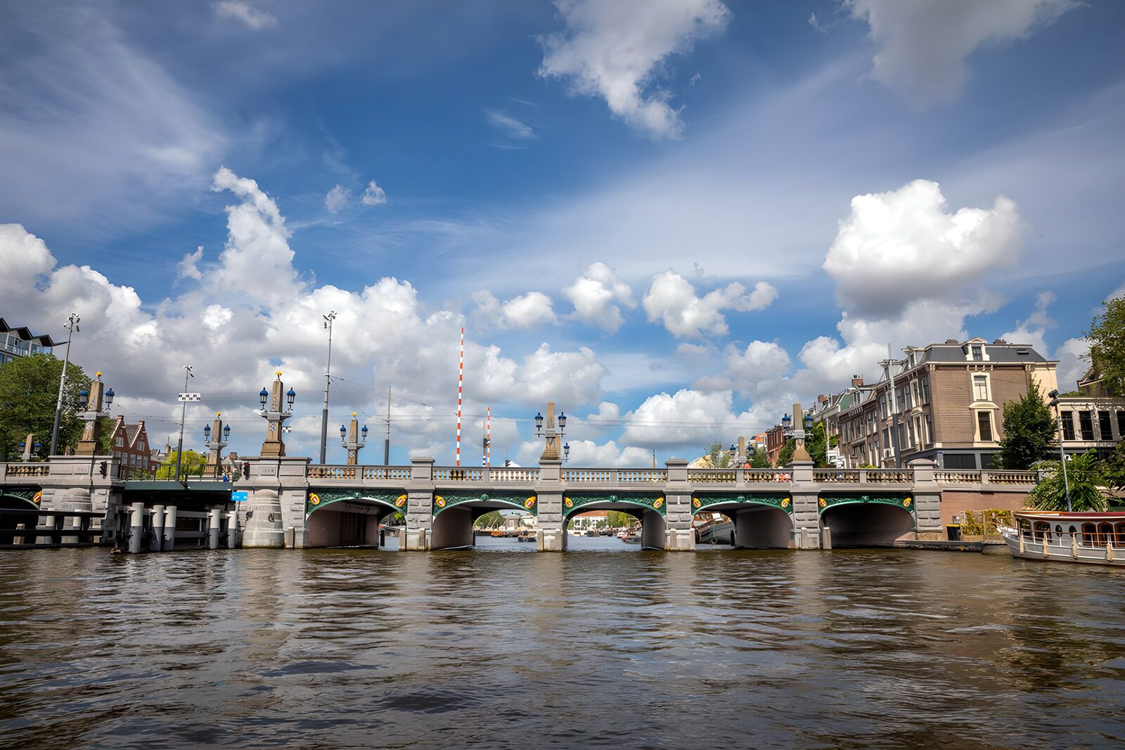 OCCOM1518046: Charming Canal Bridge Under a Blue Sky