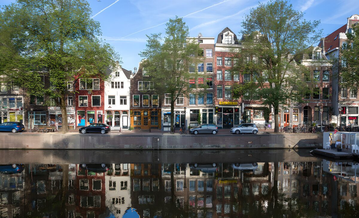 OCCOM9014437: Charming Canal-side Architecture Reflection