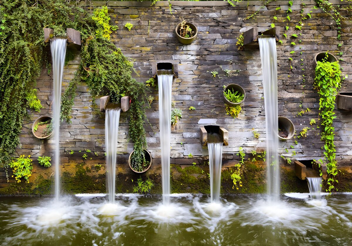Tranquil Waterfall Wall Amidst Greenery