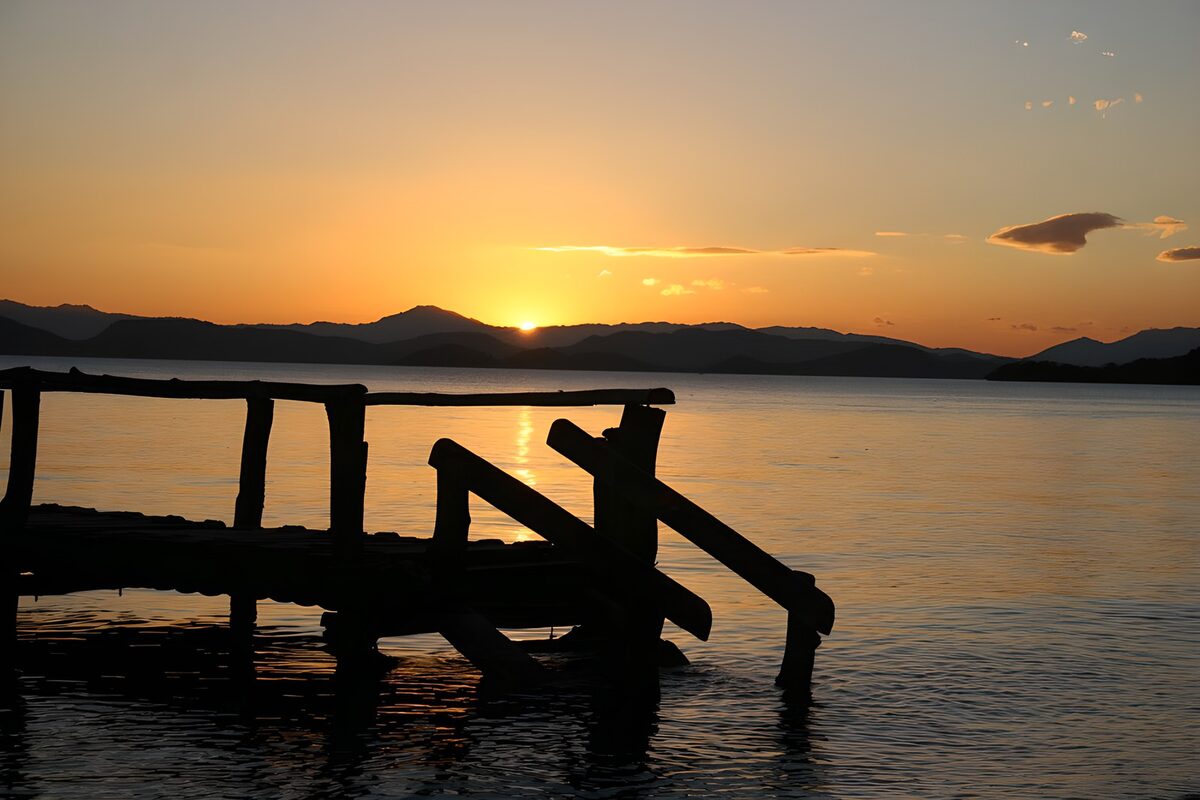 Serene Sunset Over Calm Waters