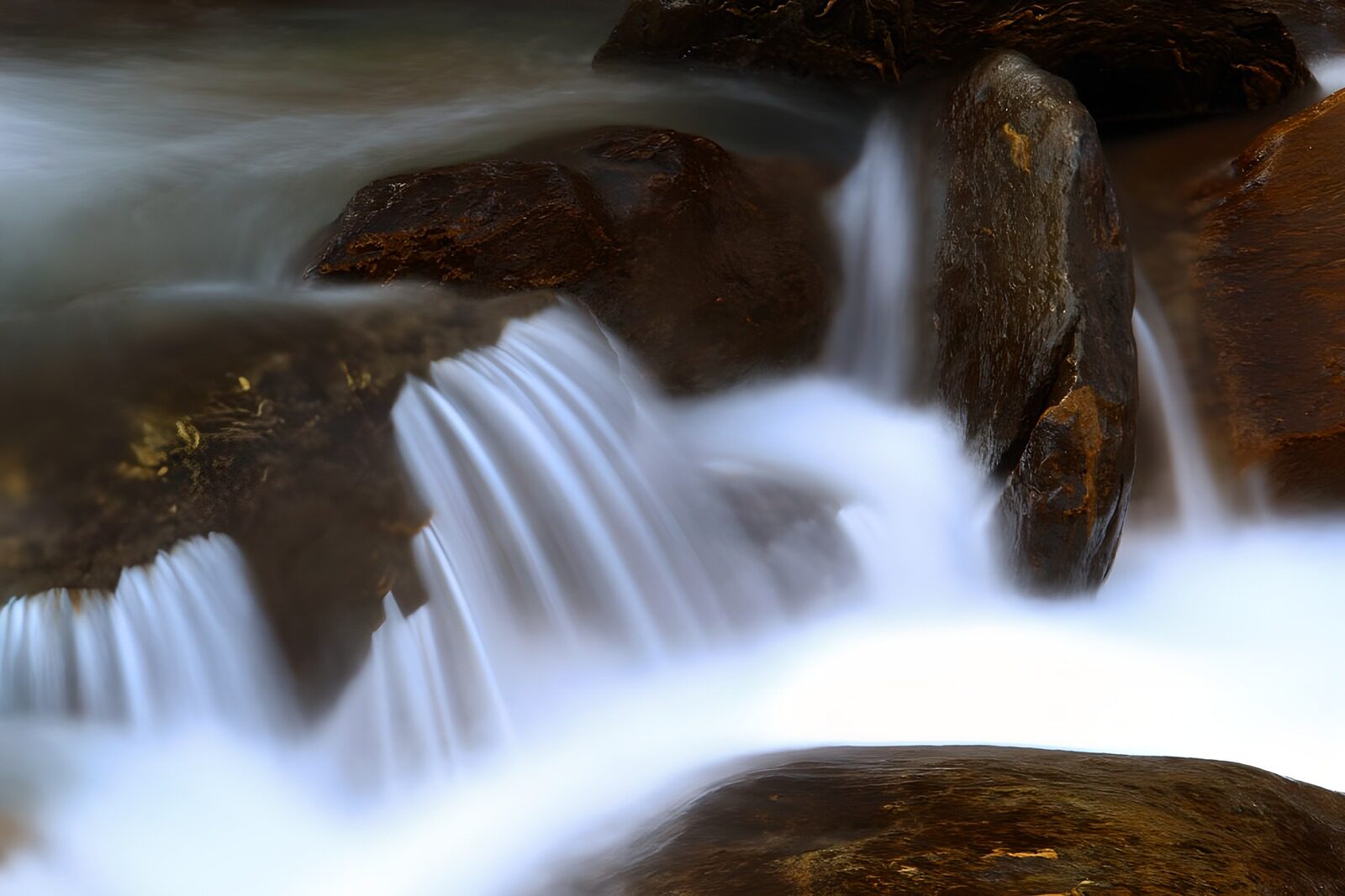 OCCOM6988333: Serene Waterfall Over Rocky Stream