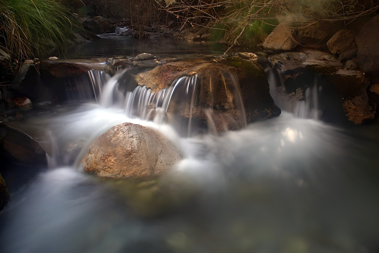 OCCOM2854231: Serene Stream with Gentle Waterfall