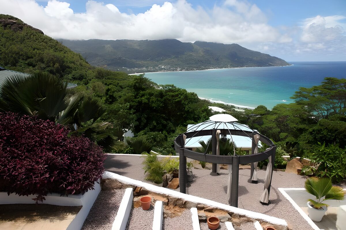 Serene Coastal View with Garden Overlook