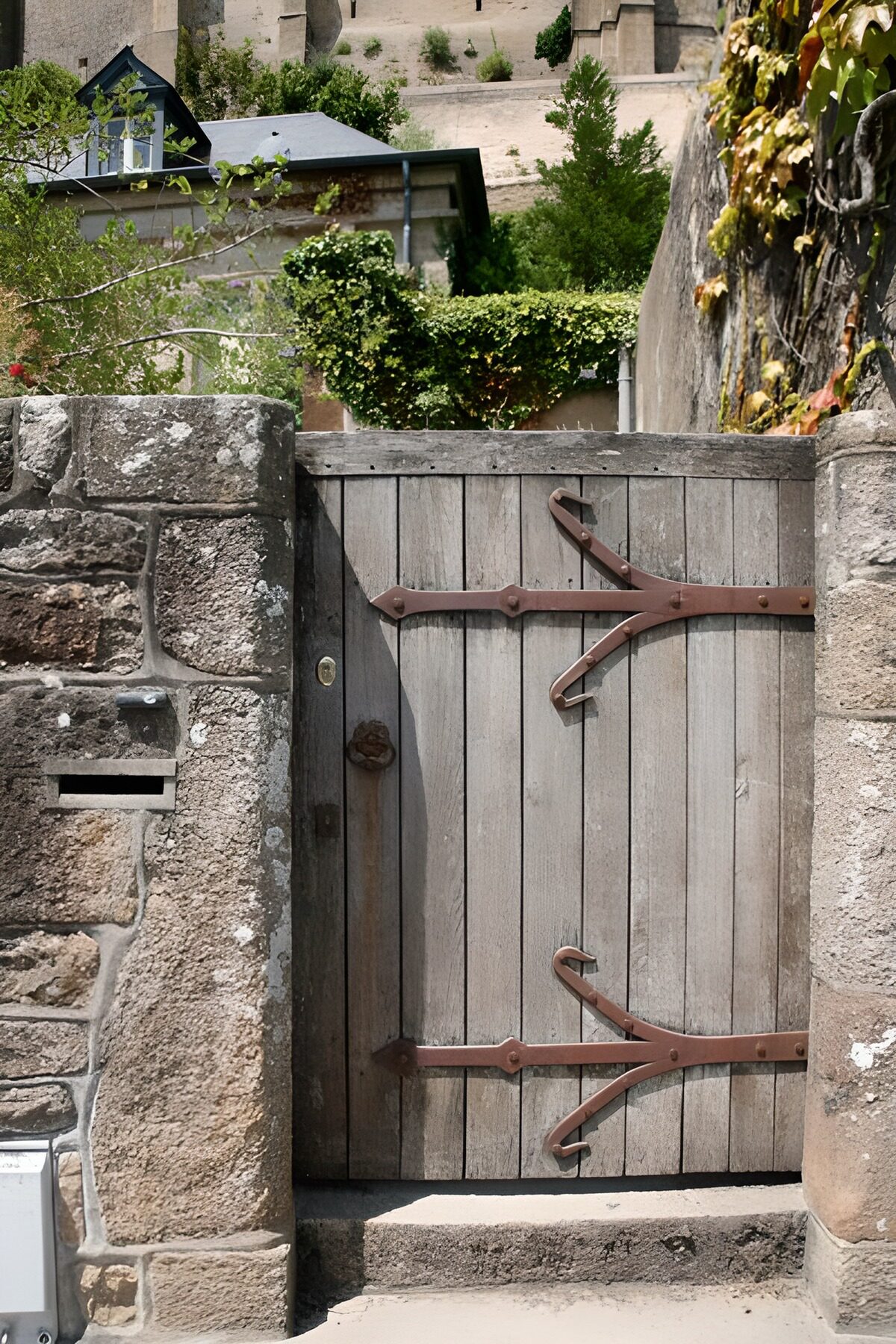 Rustic Wooden Gate in a Stone Wall