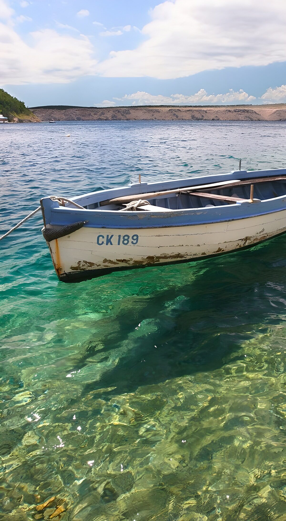 OCCOM1971840: Tranquil Waters and a Rustic Boat