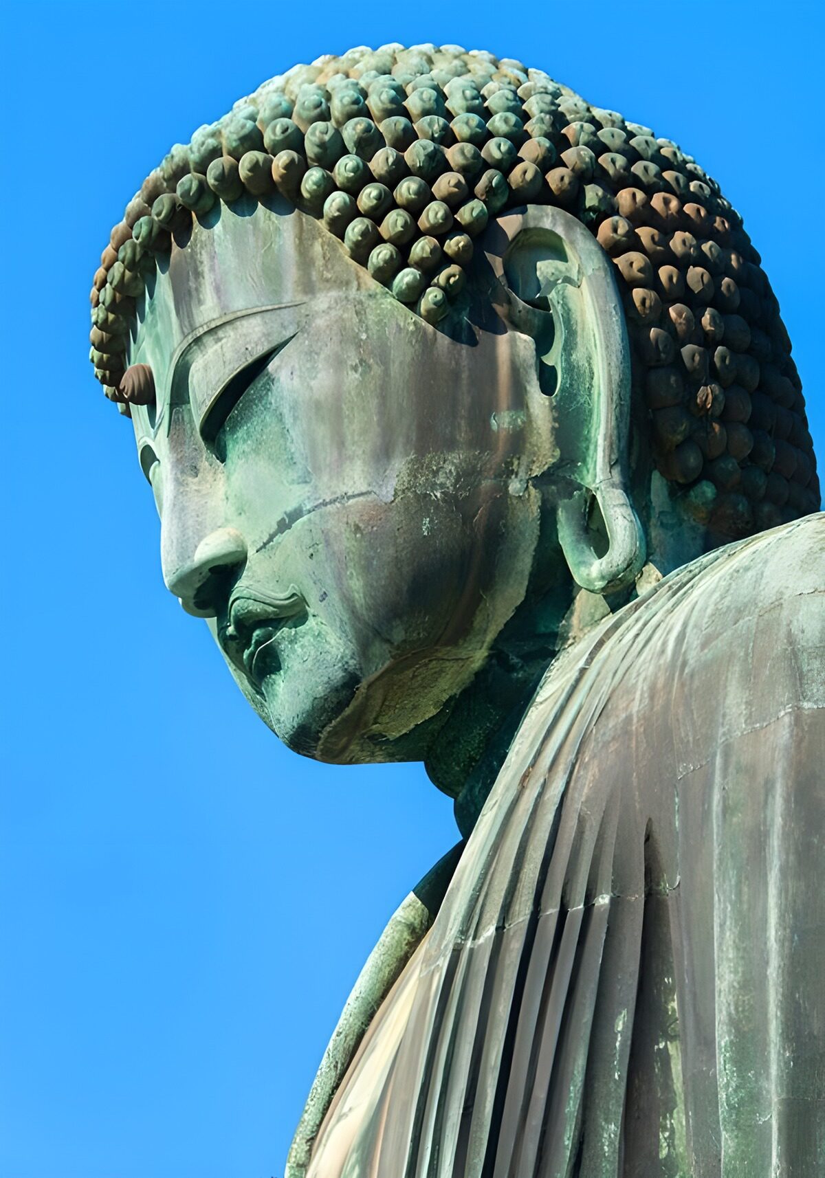 OCCOM1470651: Majestic Buddha Statue Against Blue Sky