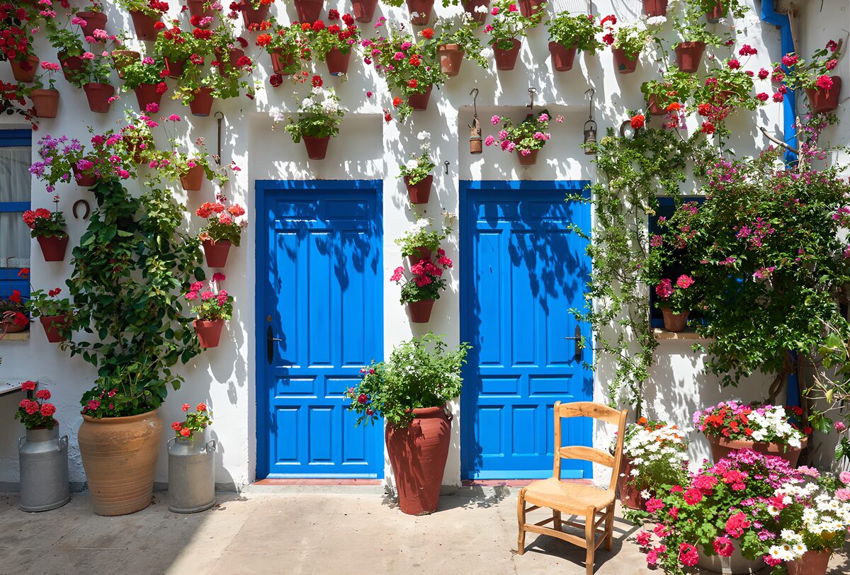 Charming Floral Facade with Blue Doors