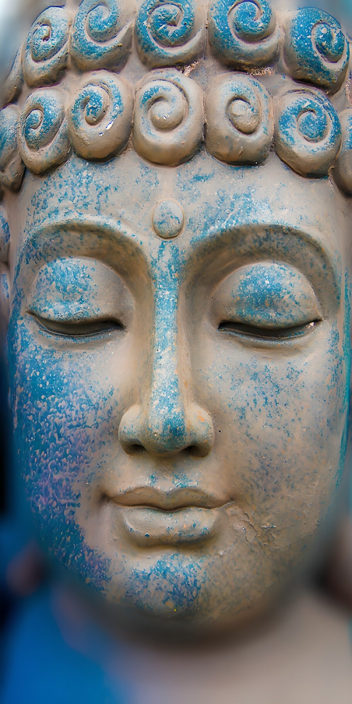 Serene Buddha Face in Blue Hues