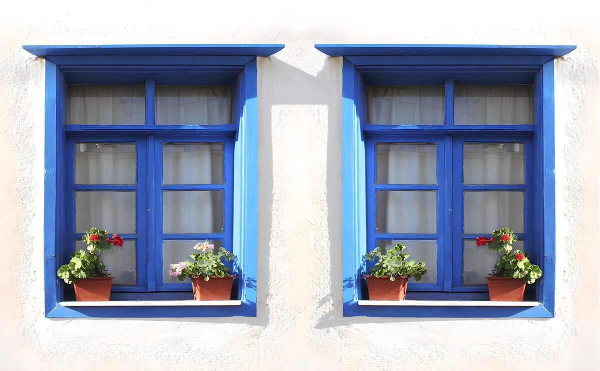 Charming Blue Windows with Flower Pots
