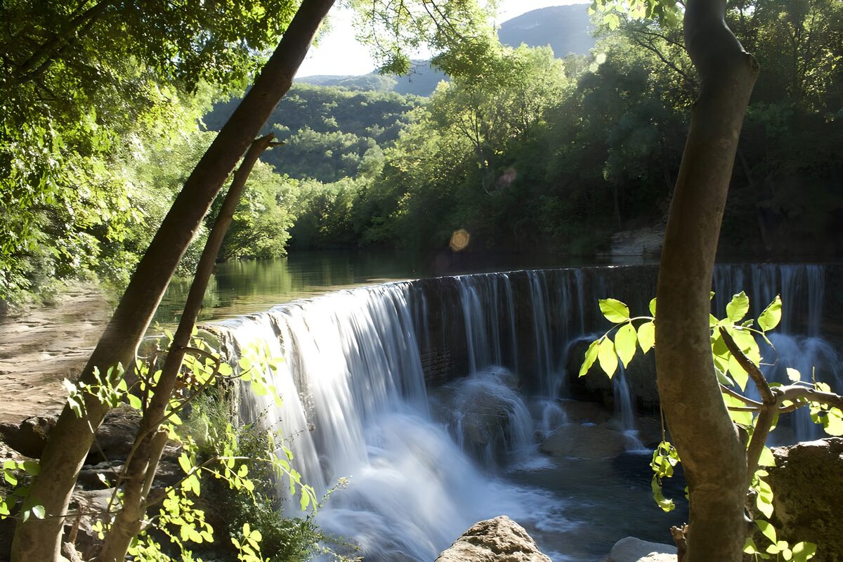 Serene Waterfall in Nature's Embrace