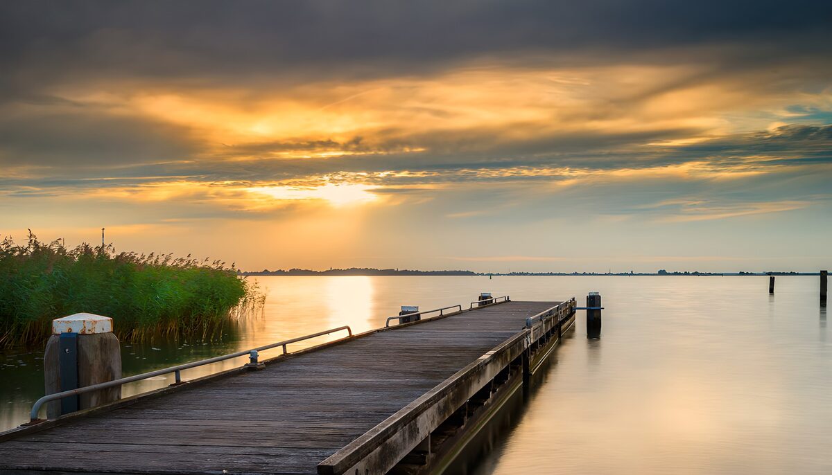 Serene Sunset Over Calm Waters
