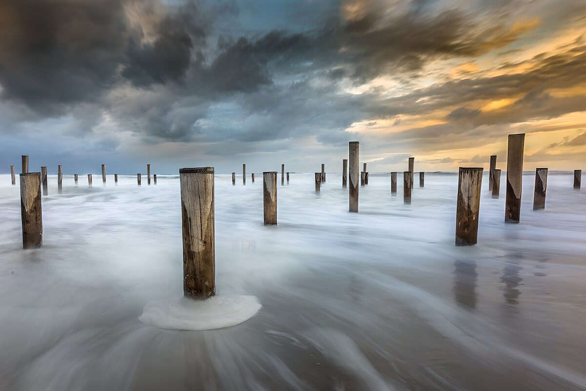 OCCOM9214157: Eroded Wharfs Beneath Stormy Skies
