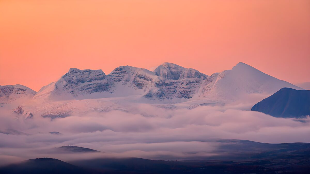 Majestic Snowy Peaks at Dawn