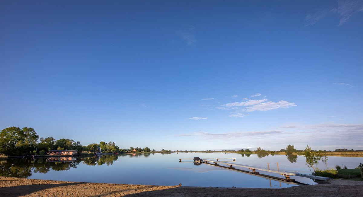 OCCOM1158483: Tranquil Lakeview Under Blue Skies