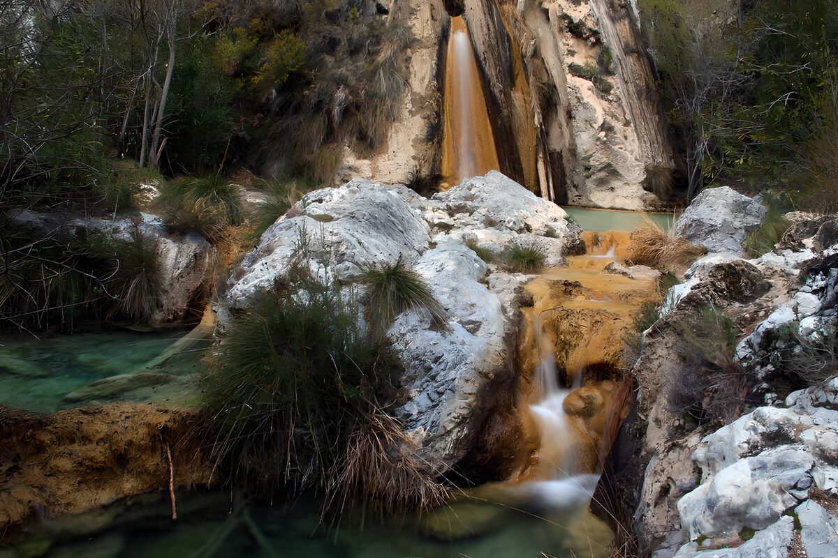 Serene Cascade in Nature’s Embrace