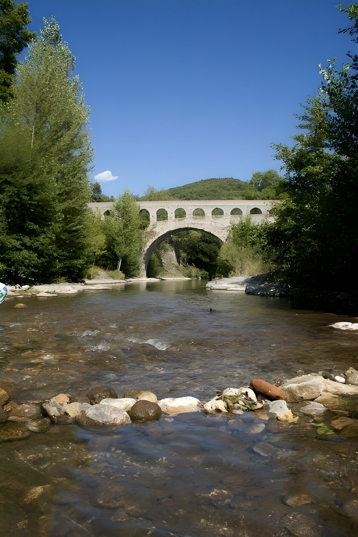 Historic Stone Bridge Over a Serene River