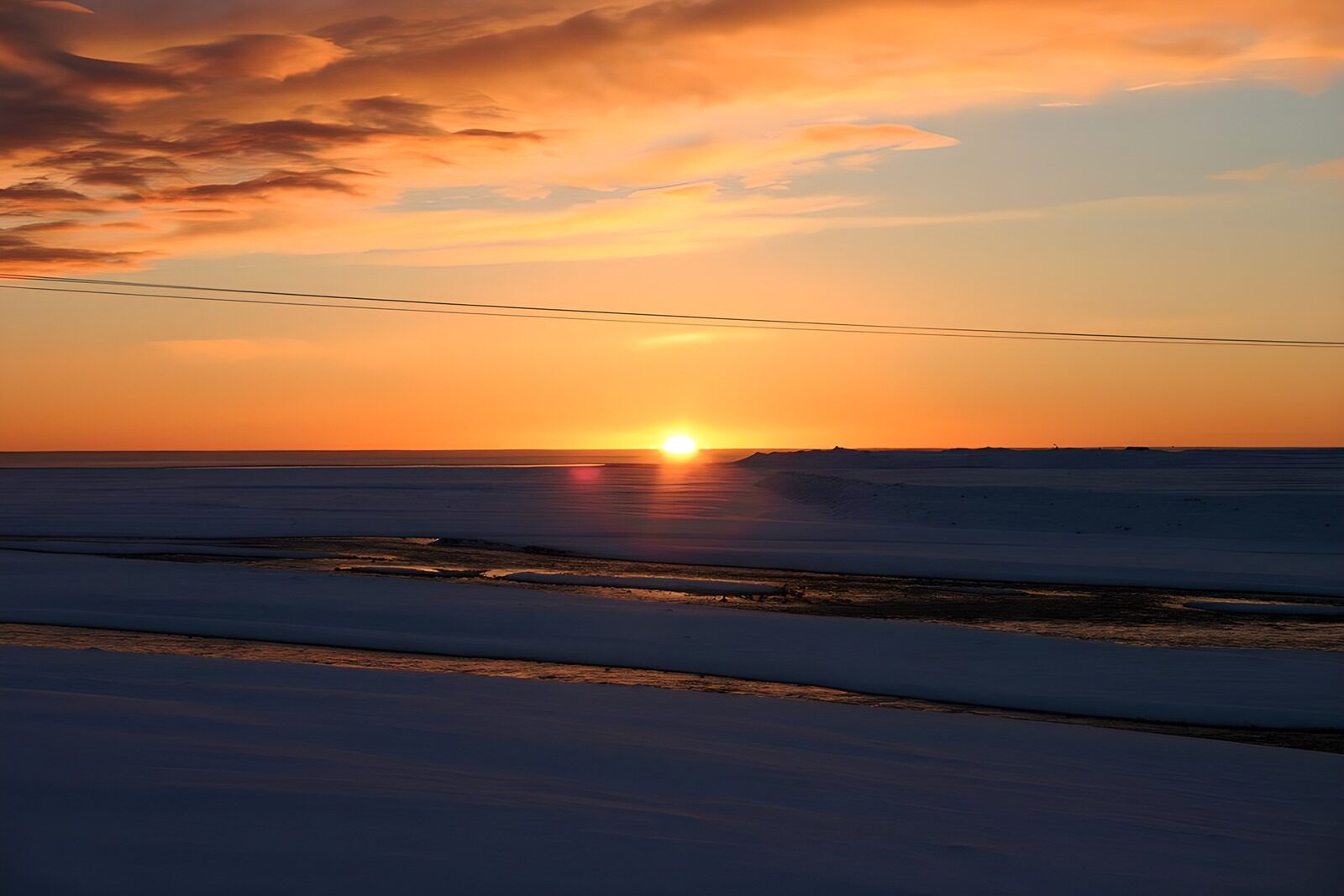 OCCOM4262244: Majestic Sunset Over Snowy Landscape