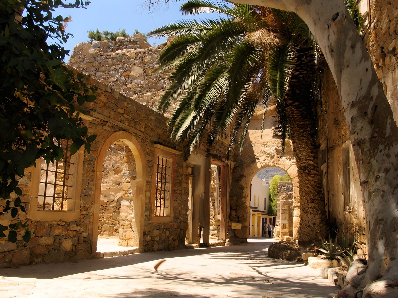 OCCOM7469916: Ancient Stone Archways in Sunlight