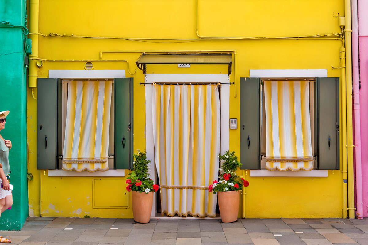 Vibrant Yellow Facade with Green Accents