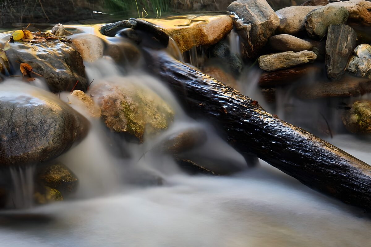 Tranquil Stream Over Rocks