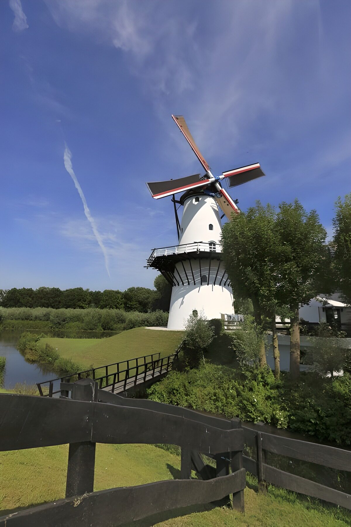 OCCOM3927466: Traditional Windmill by the River