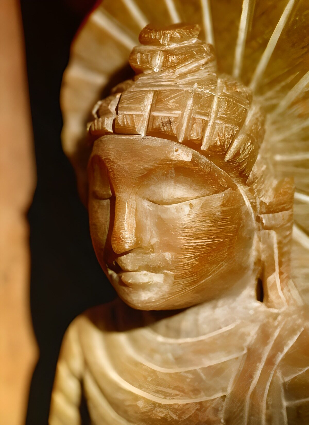 Intricate Wooden Sculpture of a Serene Figure