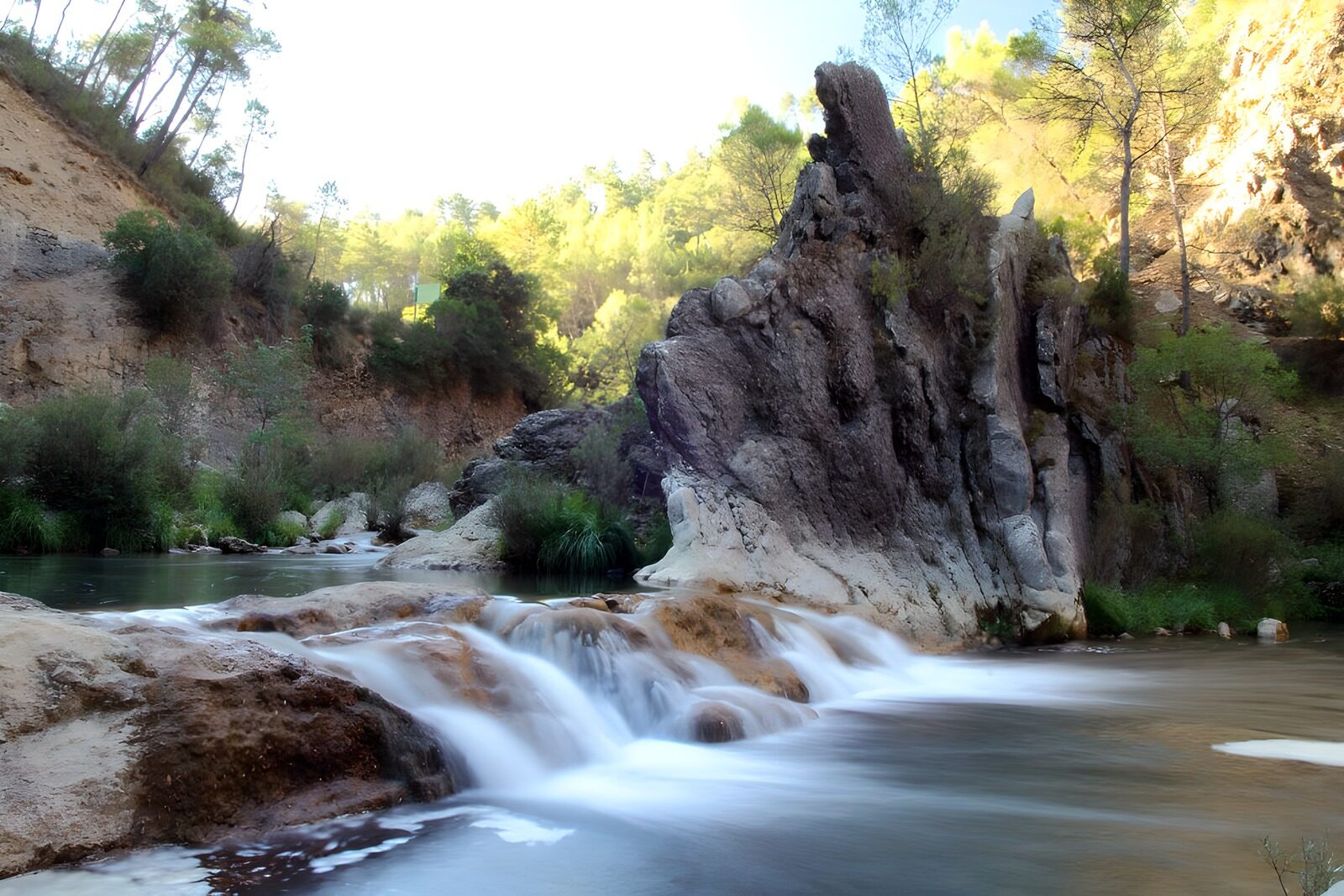 OCCOM2115697: Serene River Waterfall in Nature