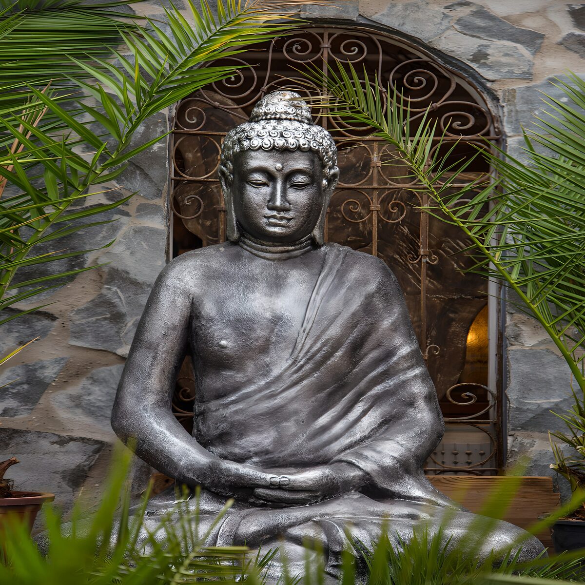 Serene Buddha Statue Amidst Nature