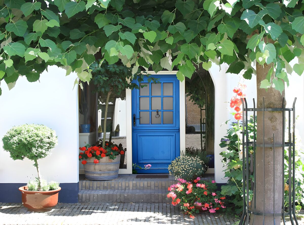 Charming Blue Doorway Surrounded by Nature