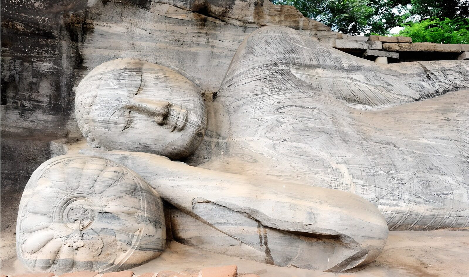 OCCOM7456372: Reclining Buddha Statue in Serenity