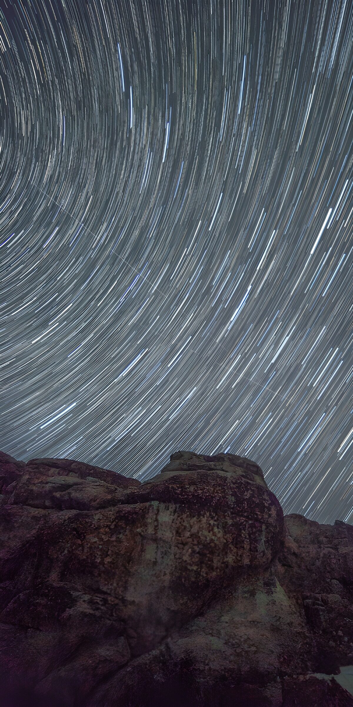OCCOM2832858: Star Trails Over Rocky Landscape