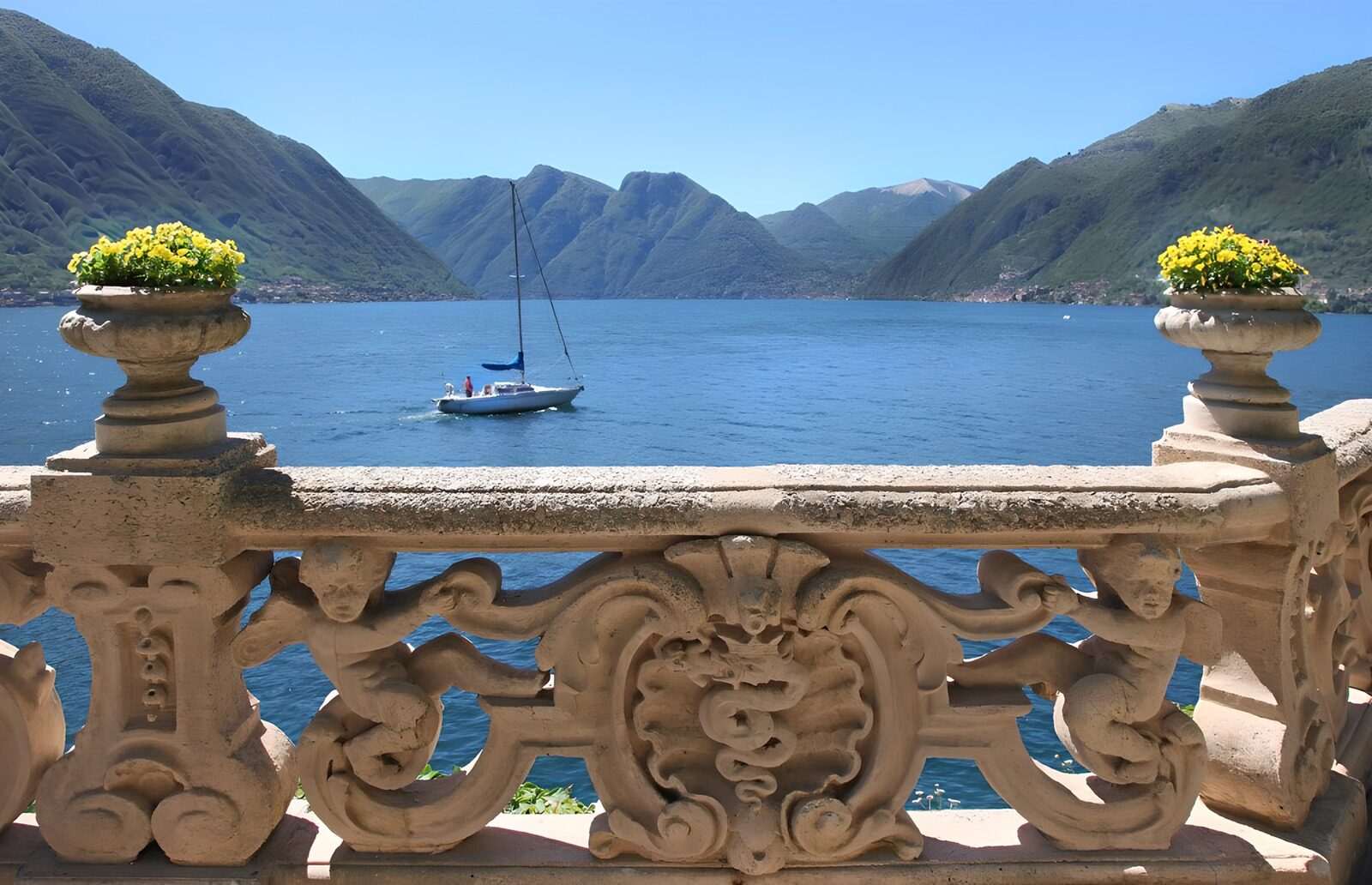OCCOM1084879: Serene Lake View with Sailboat