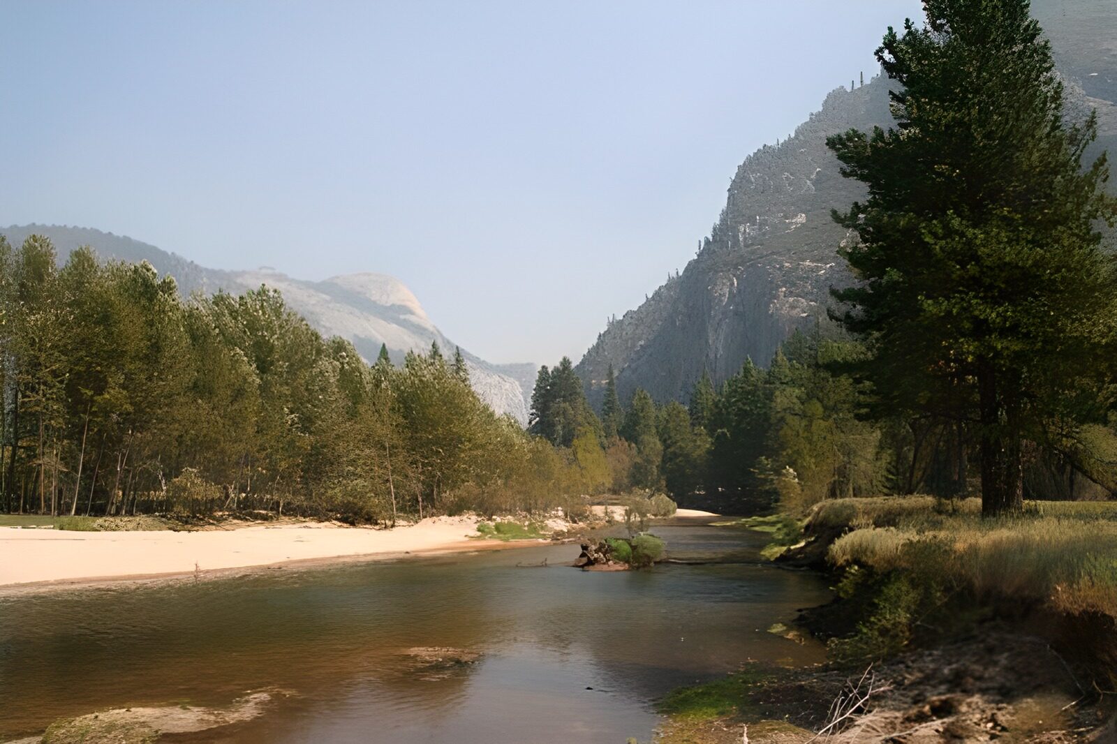OCCOM4417283: Tranquil River in Mountain Landscape