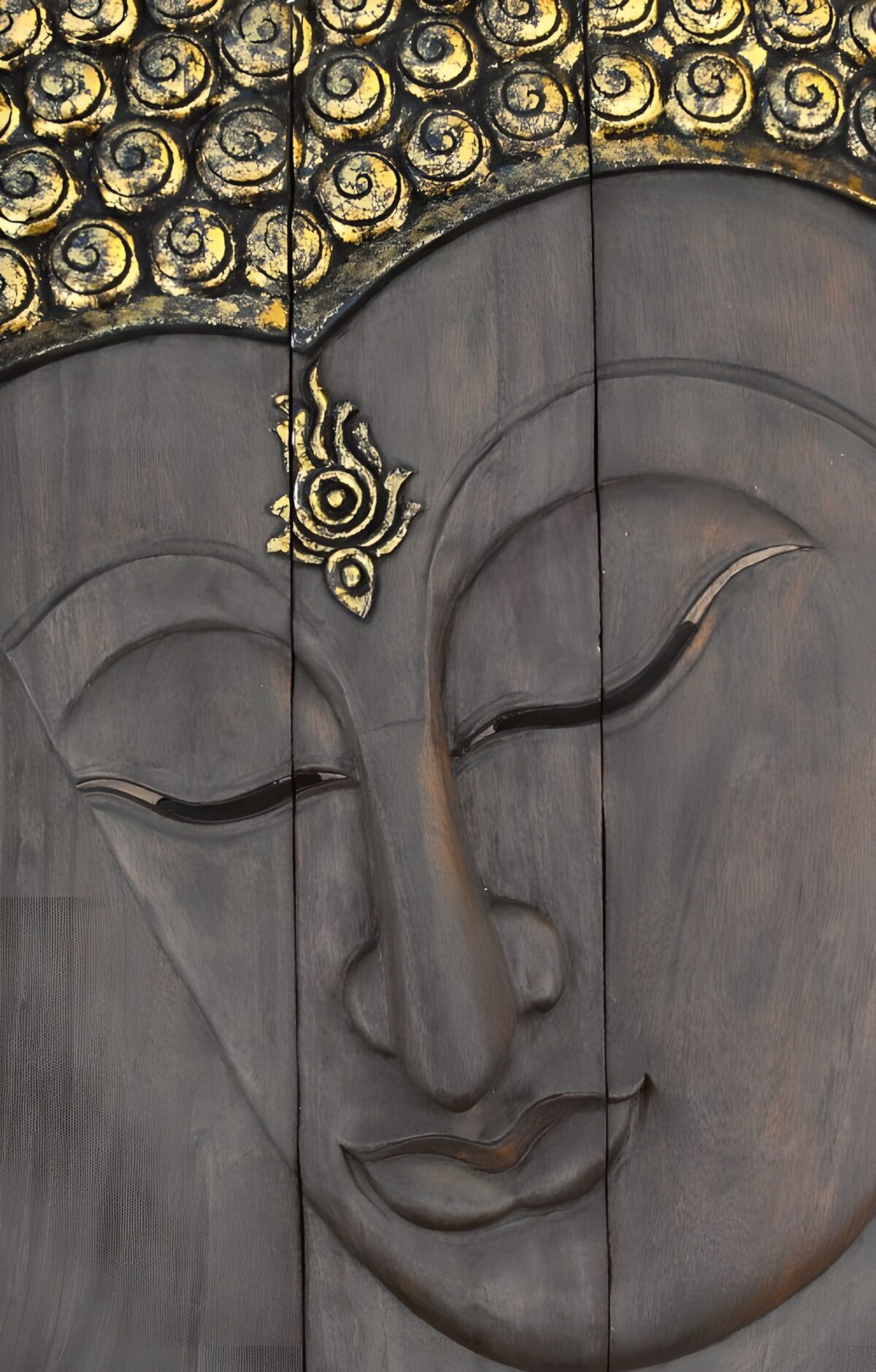 Serene Buddha Face Carving