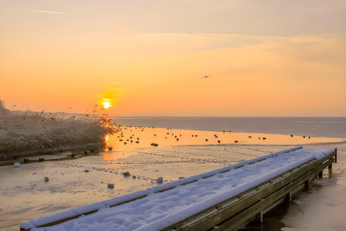 Winter Sunset Over Frozen Waters