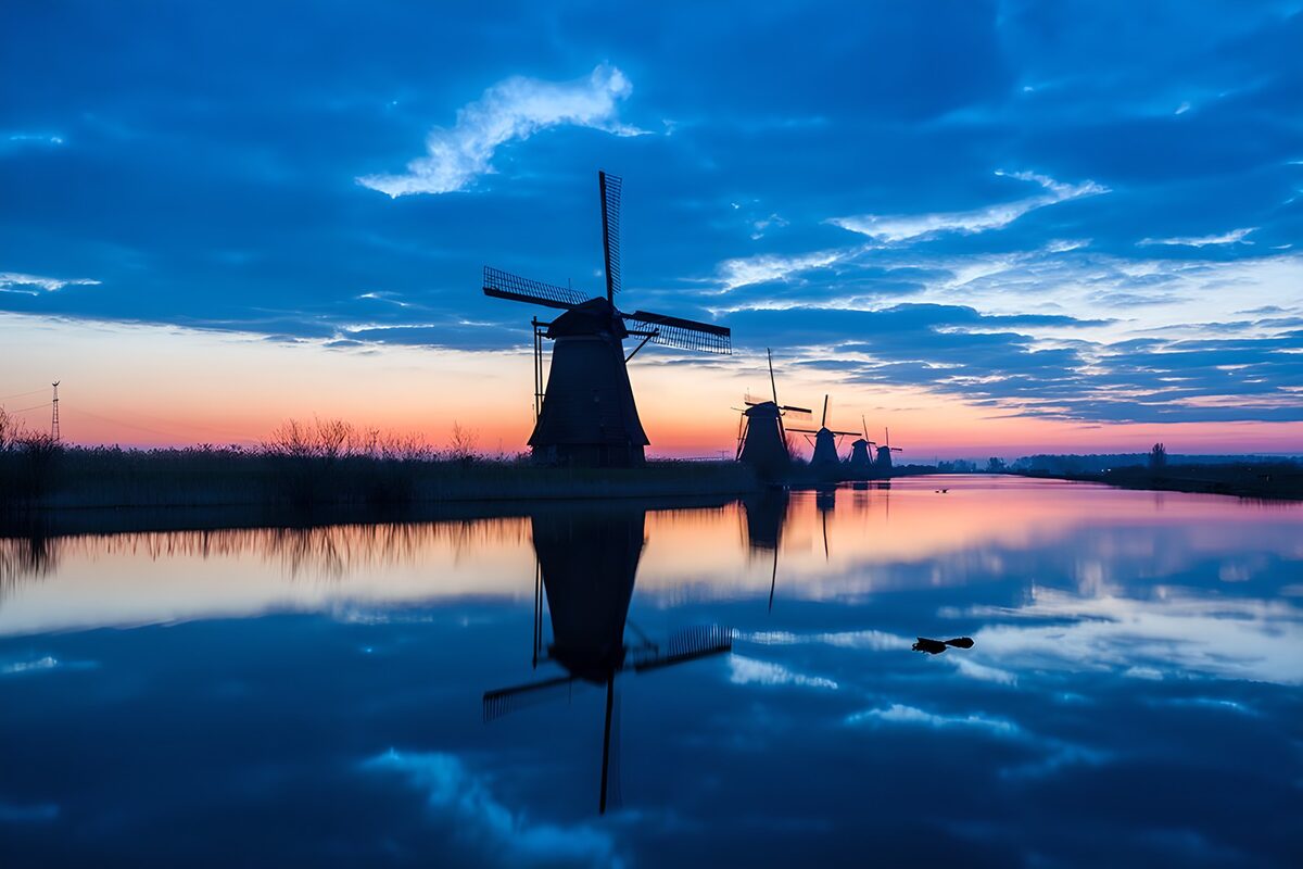 OCCOM3855189: Tranquil Sunset Over Windmills