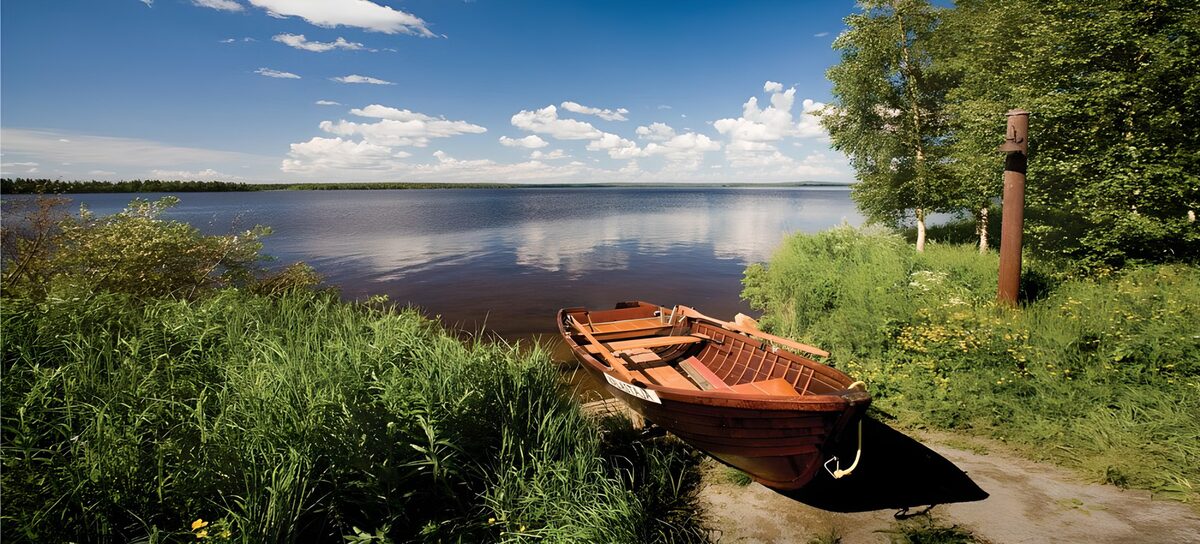 OCCOM1055315: Tranquil Lakeview with a Wooden Boat