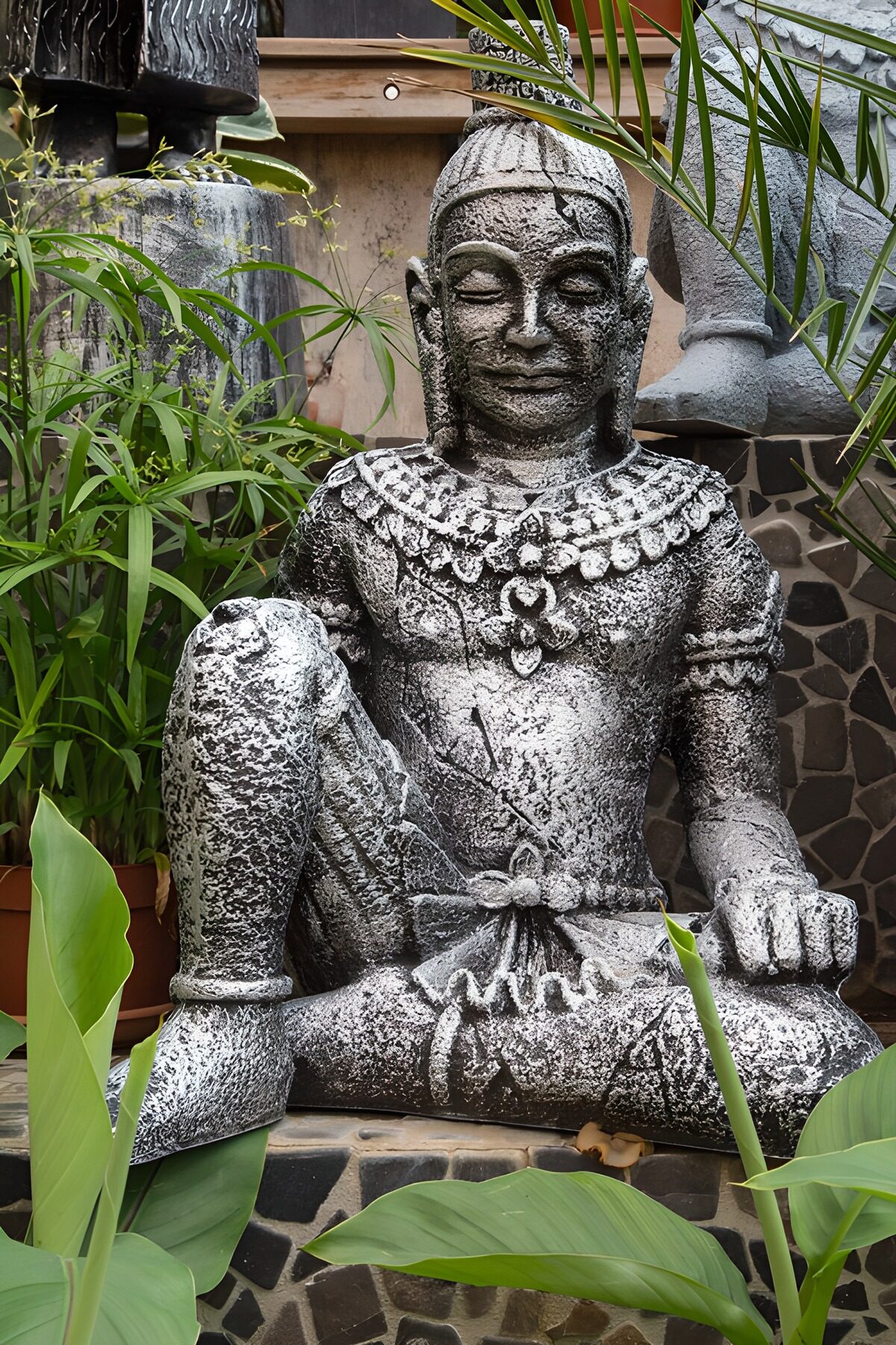 OCCOM8484577: Serene Stone Buddha Statue in Nature