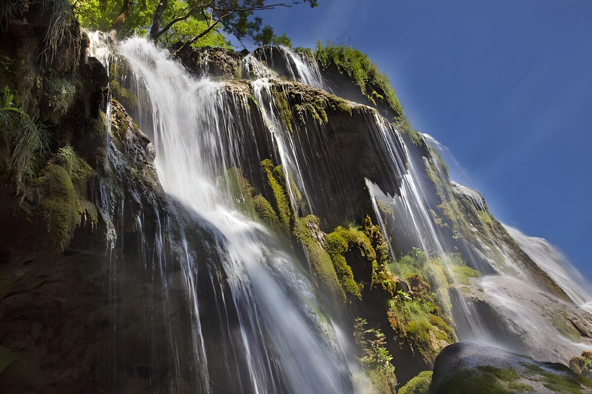 Majestic Waterfall in Lush Greenery