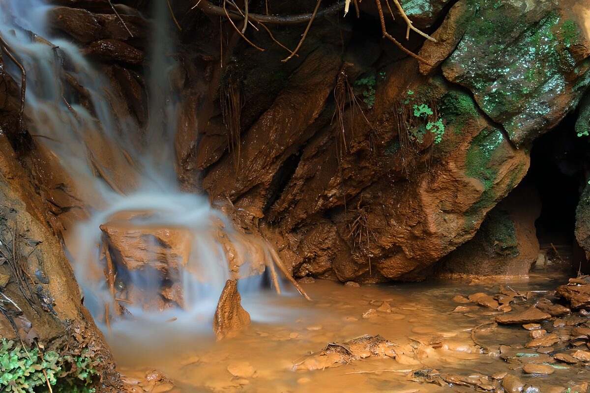 Serene Waterfall in Rocky Cove
