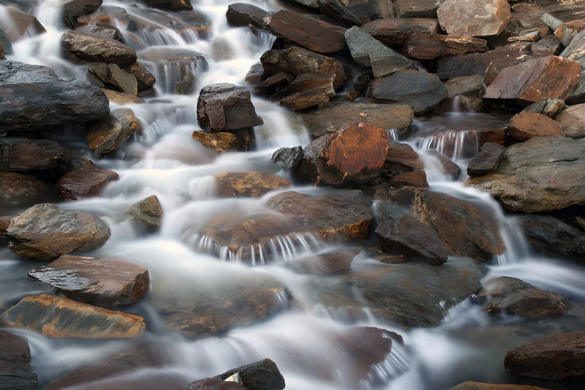 OCCOM2583727: Serene Flow of Water Over Stones