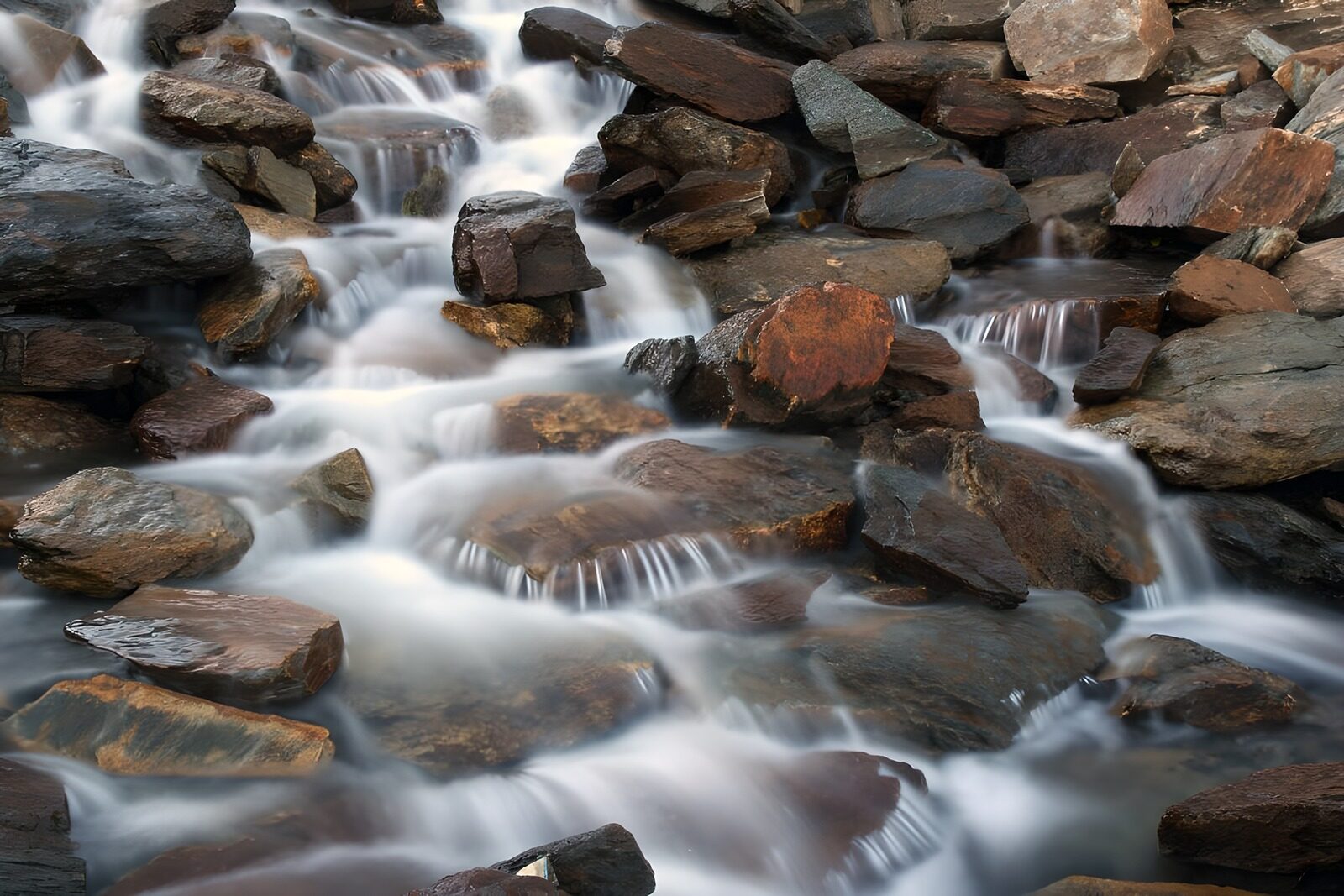 OCCOM2583727: Serene Flow of Water Over Stones