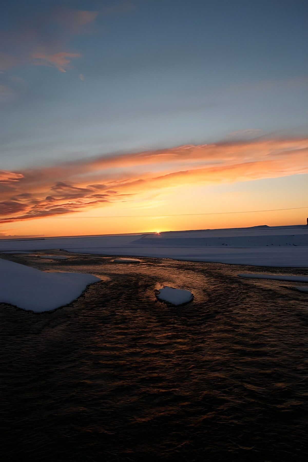 Serene Sunset Over Icy Waters