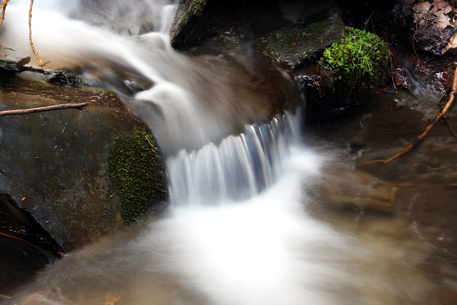 OCCOM5583549: Gentle Stream Cascading Over Rocks