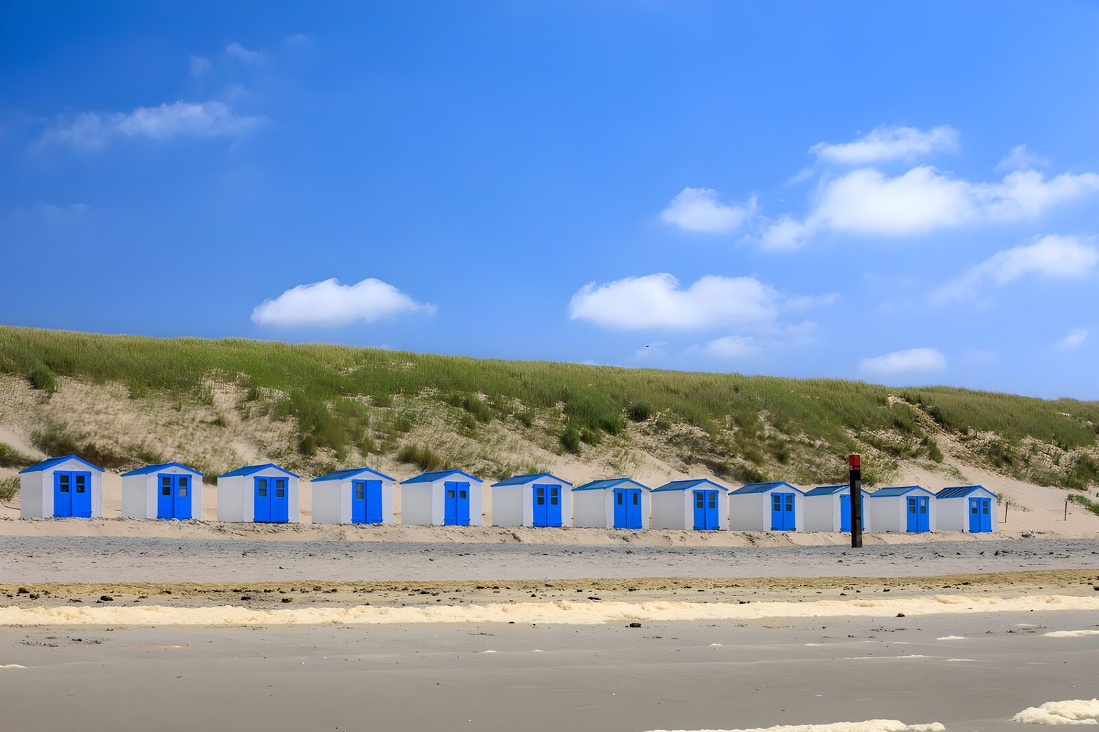 OCCOM1967108: Colorful Beach Huts by the Shore
