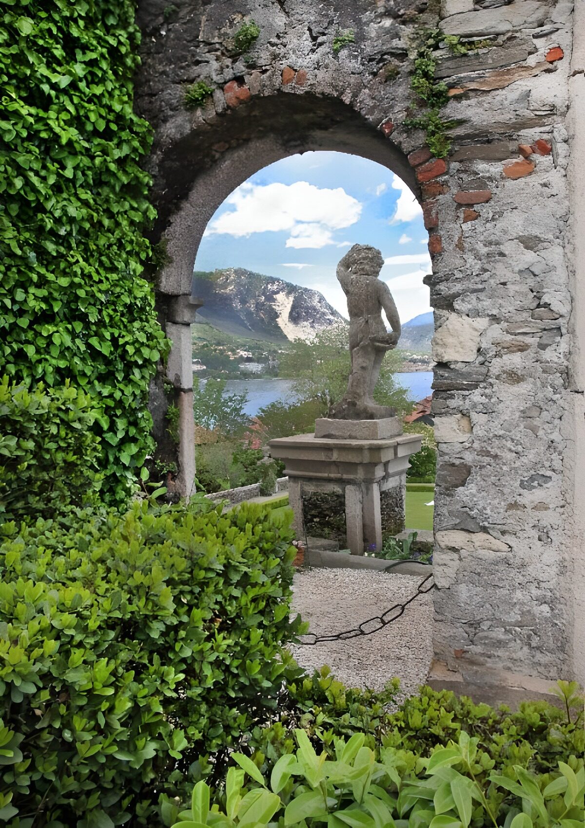 Serene Garden View Through Stone Arch