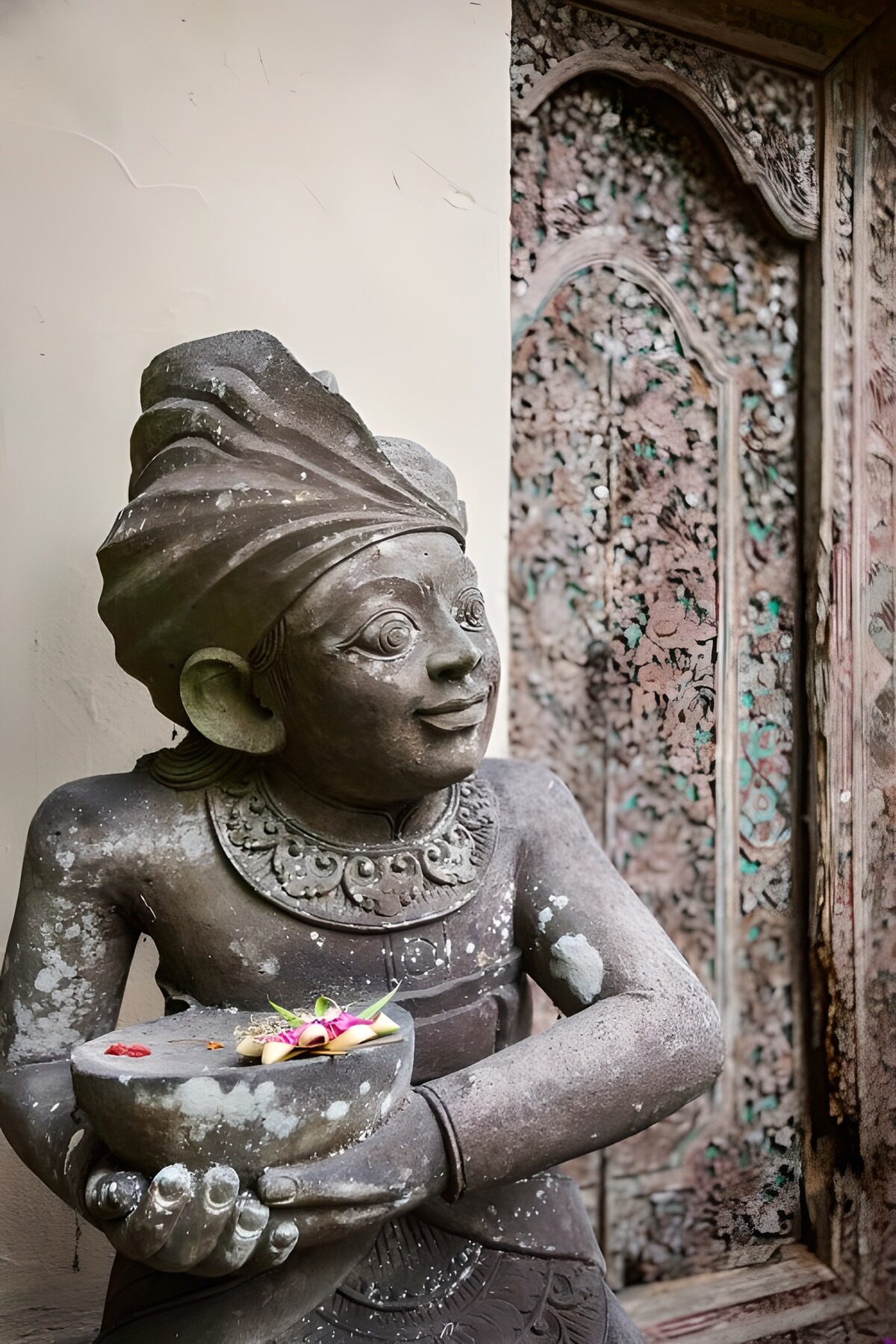 Balinese Stone Statue with Offerings